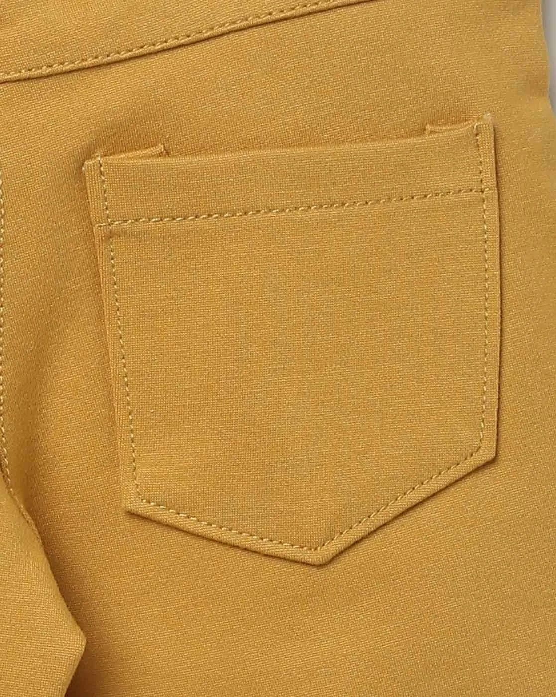 Tiny Girl Mustard Capri Has A Slip On Closure With Front Buttons